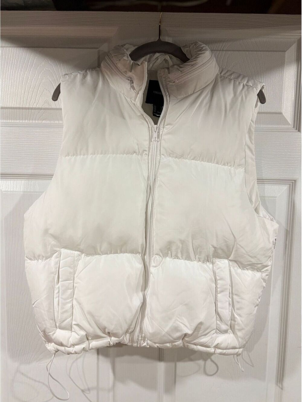 #211 NWT Forever 21 Puffy Vest with stored hood- Callout